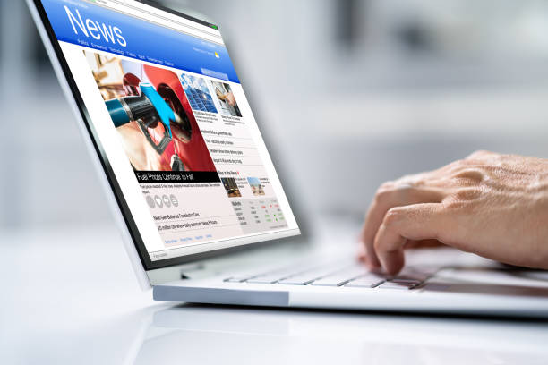 istock Man Reading News Website 1418357332