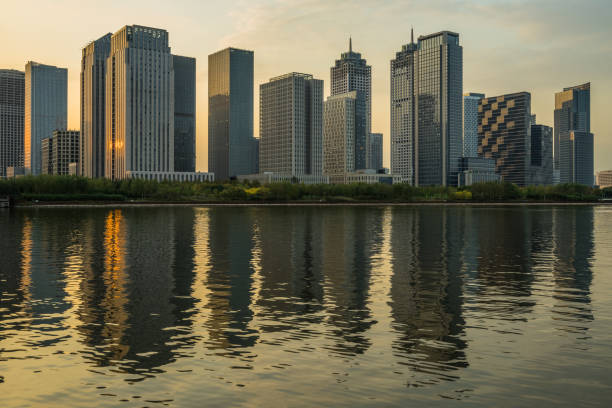 istock Modern city waterfront downtown skyline at dusk,China. 1418359061