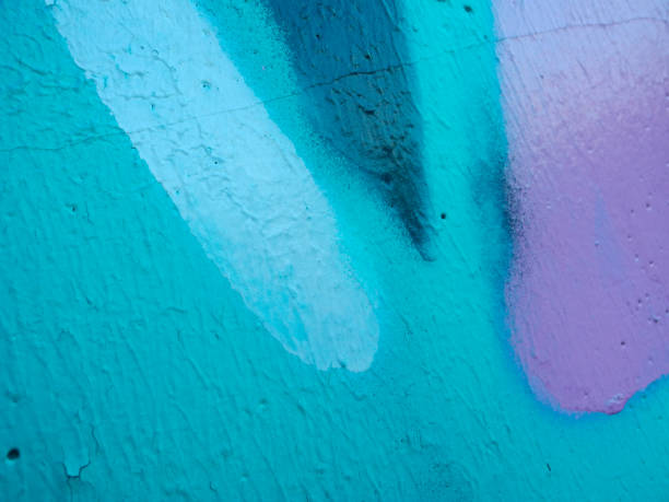 istock Bright streaks of paint on a wall. Empty abstract background. 1418360384