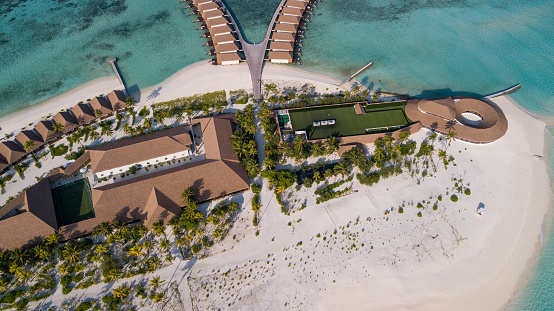 Male Atoll, Maldives - June 25, 2021: Fantastic Top  View to the Pool and Other Buildings with the Palm Trees near