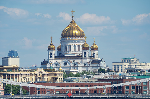 Cathedral of Christ the Savior in Moscow close-up on the background of modern buildings, Russia