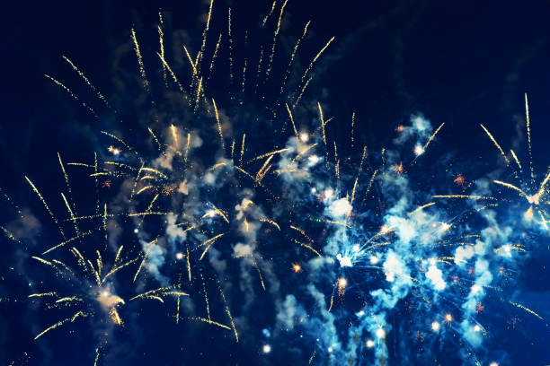 istock Bright, beautiful blue fireworks in the night sky. 1418386200