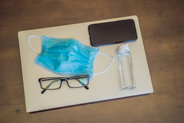 istock Coronavirus. Working from home wearing protective mask. quarantine for coronavirus wearing protective mask. Working from home 1418390460