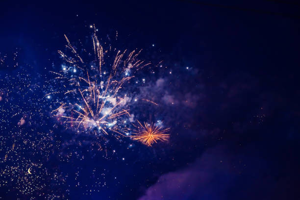 istock Bright, beautiful blue fireworks in the night sky. 1418390696