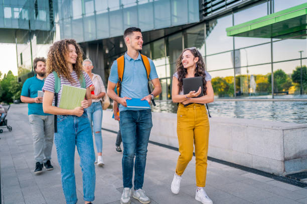 istock Friends walking to university 1418392155
