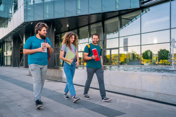 istock Friends walking to university 1418393777