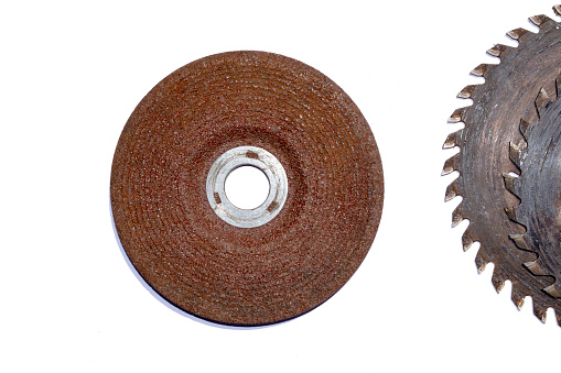 Old circular saw blade isolated on white background
