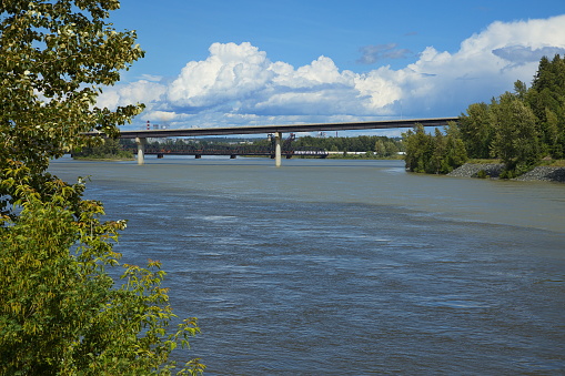 Road bridge and railway bridge over Fraser River at Prince George in British Columbia,Canada,North America