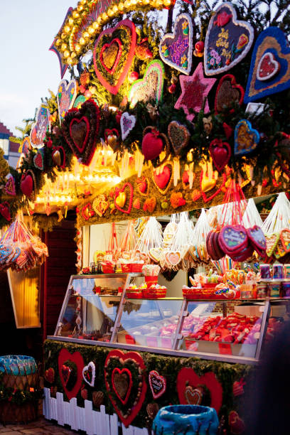 Market stall at the Christmas market and gingerbread hearts, Dresden, Germany stock photo