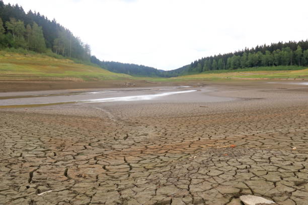 istock A dried up empty reservoir and dam during a summer heatwave, low rainfall and drought in Saxony, Germany, Talsperre Lehnmuehle 1418410447