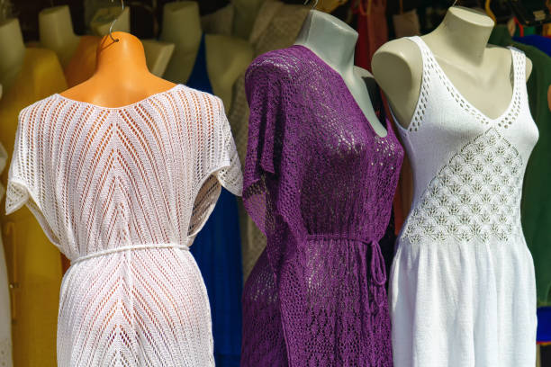 istock Knitted translucent dresses on mannequins for sale 1418411318