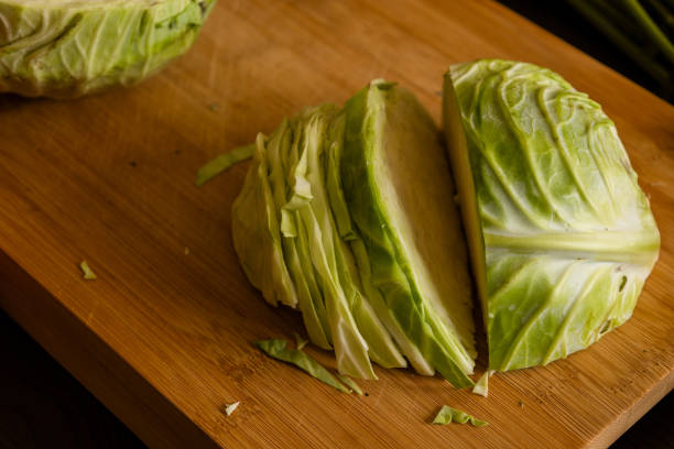 istock cut white cabbage on wooden board at home 1418413161