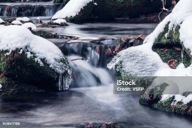Travensky Waterfall In The Visalaje Area In The Beskydy Mountains Eastern Czech Republic In A Protected Area The Water Breaks Through A Layer Of Snow And Fallen Logs Cleanliness And Purity Stock Photo - Download Image Now