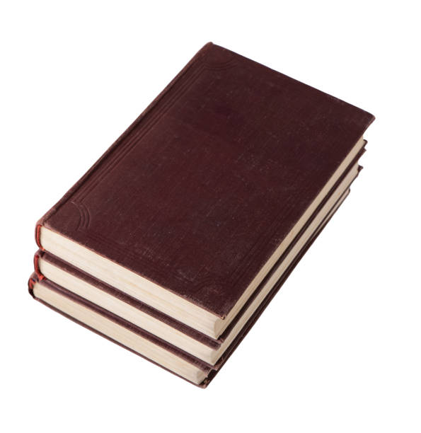 istock Stack of old books. Library shelf. The book is in a cloth cover. Vintage binding. 1418436183