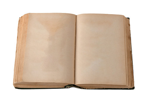 Pages of an old open book. Yellow page piece of paper. Blank spread with space for text. Top view. Copy space.