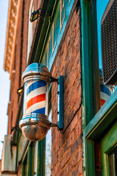 istock Barber shop exterior and barber pole 1418439155