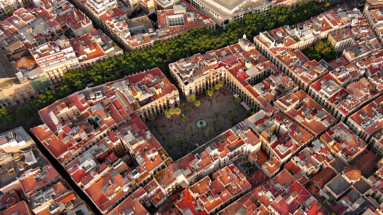Aerial view of the iconic Plaça Reial square (Plaza Real) in Barcelona city center, during a sunny day of summer