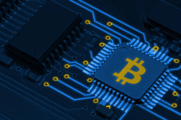 istock Close-up picture of a PCB with bitcoin symbol 1418442208