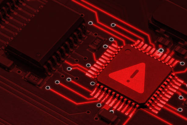 istock Close-up picture of a PCB with warning symbol 1418442229