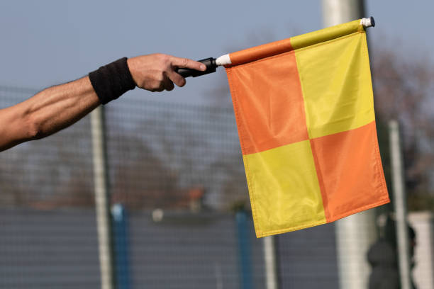 Soccer linesmen (line official) Soccer linesmen (line offical)  in action offside stock pictures, royalty-free photos & images