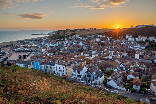 Wide angle view of Hastings old town at sunset. East Sussex, England, UK