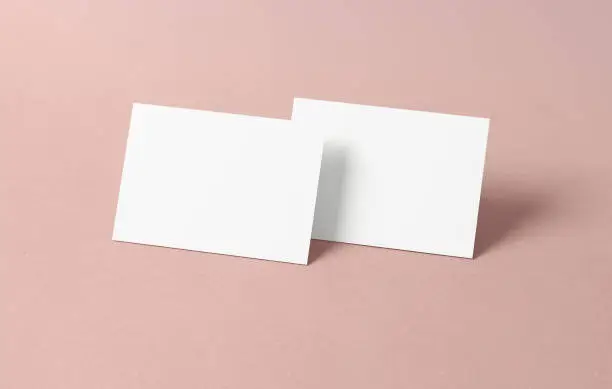 Postcard mockup blank paper double sided template on a color background. White empty card for design.