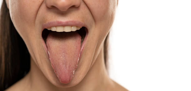 istock front view of a woman tongue 1418454565