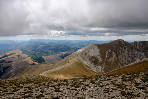 Looking down from the top of the Mt. Vettore on a Cloudy day