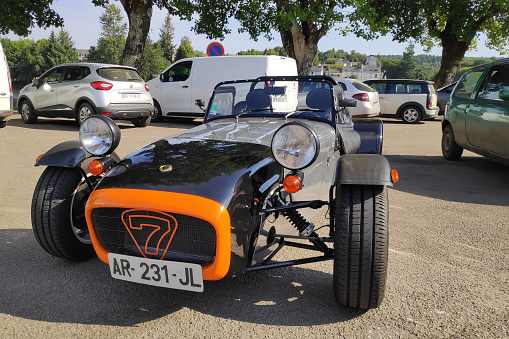 Huelgoat, France - August 13 2022: The Caterham 7 is a super-lightweight sports car produced by Caterham Cars in the United Kingdom.