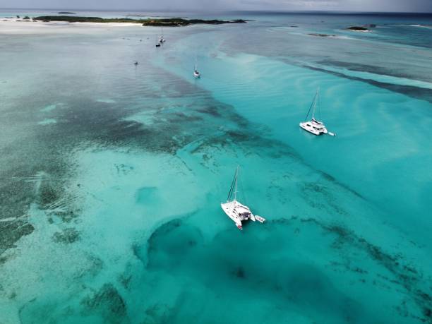 istock Yachts Anchored at Norman's Cay, Bahamas 1418474558
