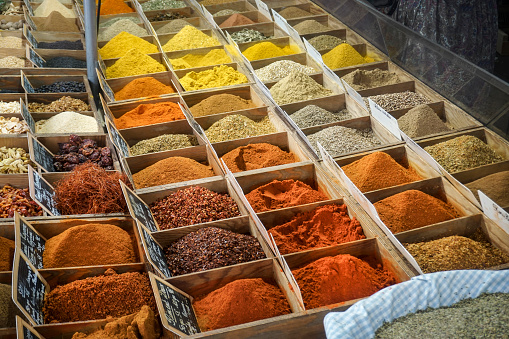 Various Mediterranean spices on a market stand.