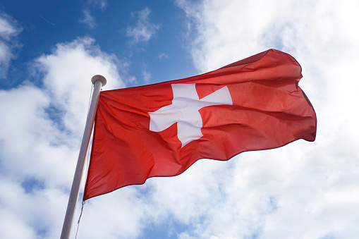 Flag of Switzerland waving in the wind.