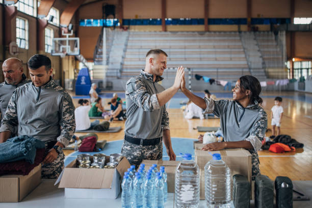 istock Soldiers preparing donations for civilians 1418476152
