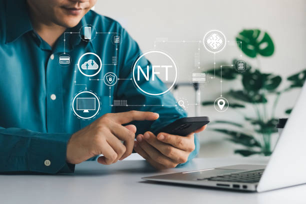istock businessman finger touch virtual screen, NFT token digital crypto art blockchain technology concept. 1418476191