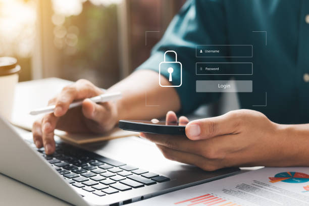 istock Cybersecurity internet and networking concept. Close up of hand holding smartphone information security and encryption, secure access to user's personal information, secure Internet access. 1418477033