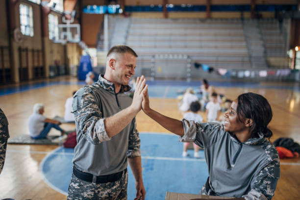 istock Soldiers preparing donations for civilians 1418478006