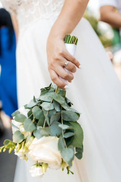 istock Bride holding her wedding bouquet 1418478190