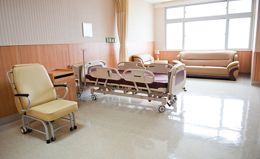 Clean empty bed in a hospital ward