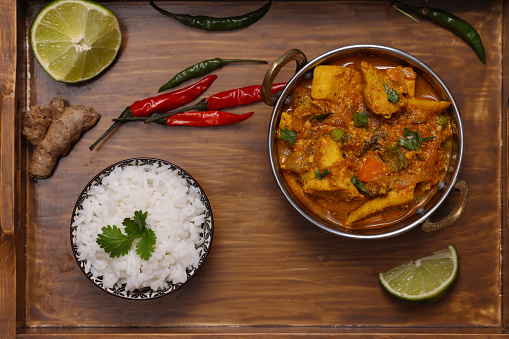 Chicken Curry with Basmati Rice on serving tray. High resolution image 45Mp taken with Canon EOS R5 and associate macro lens