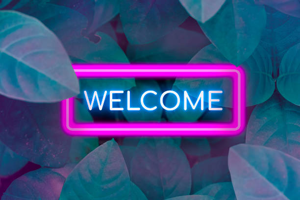 istock Welcome neon banner on maple foliage leaves. 1418483928