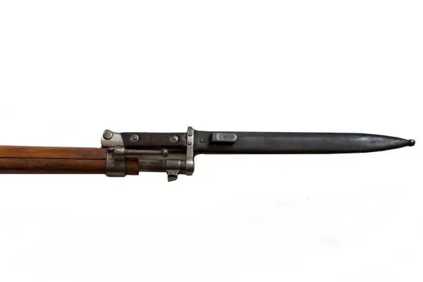 detail of shotgun with bayonet