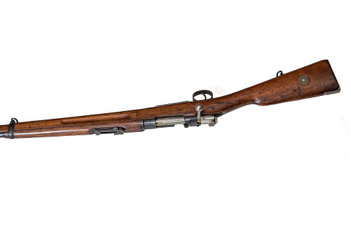 brown war rifle on a light background