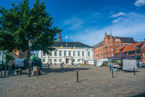 The Artus Court and the Neptune Fountain at night in city of Gdansk in Poland.