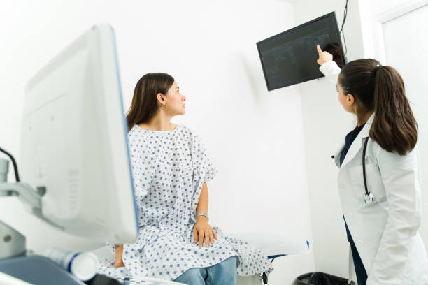 istock Doctor explaining the medical diagnosis after doing a sonogram 1418492216