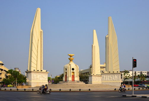 Bangkok, Thailand: Democracy Monument, architect Chitrasen Aphaiwong, 1939 - celebrates the constitution adopted after the Siamese revolution of 1932 - traffic circle on the wide east-west Ratchadamnoen Avenue, at the intersection of Dinso Road.