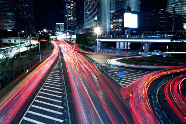 istock Abstract motion-blurred view of speed light at night 1418495703