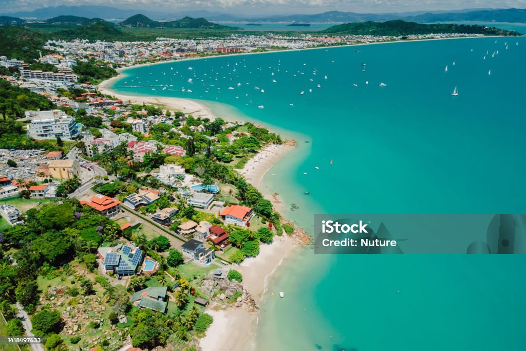 Tropical holiday beach with Jurere town. Aerial view of Florianopolis Florianópolis Stock Photo