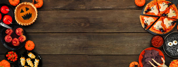 istock Fun Halloween dinner party double border over a dark wood banner background 1418503532