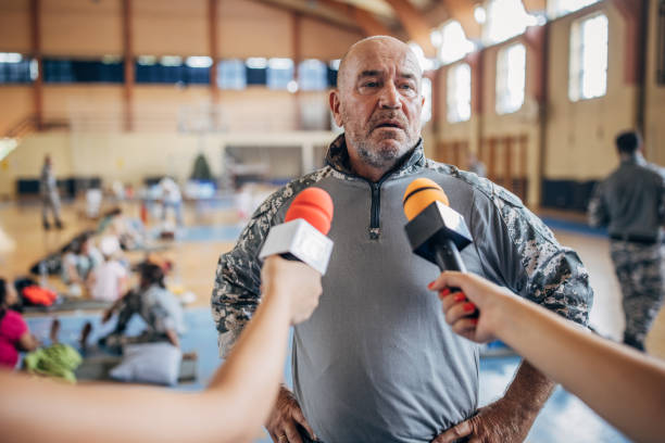 istock Press talking to a soldier 1418511038