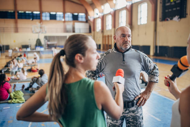 istock Press talking to a soldier 1418511074